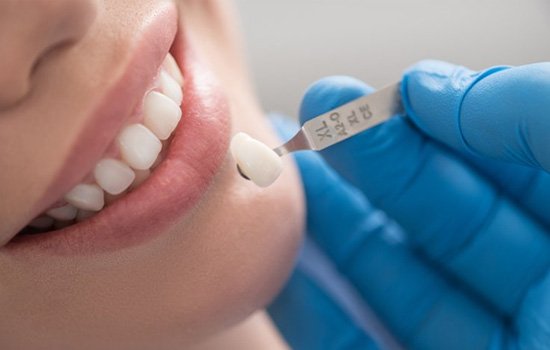 a patient undergoing the dental crown process