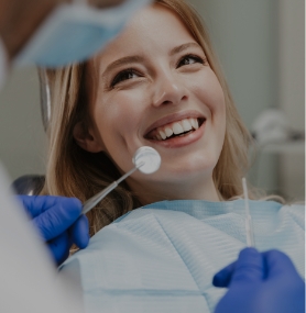 Woman smiling during dental checkup