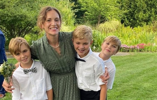 Doctor Maier with her three sons outdoors