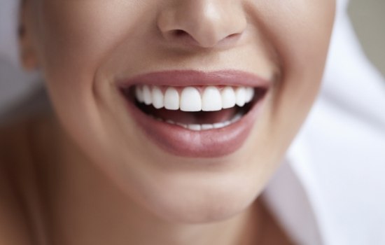 Close up of smile with straight white teeth