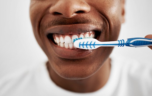 Man brushing his teeth